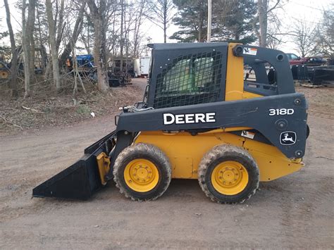 my 318D JD skidsteer hydraulic filter restriction comes on